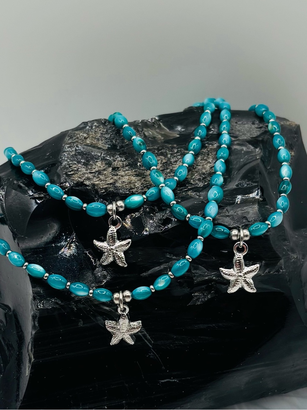 *ANKLET* S. Steel Starfish Wing & Teal Dyed Shell Stretchy Anklet